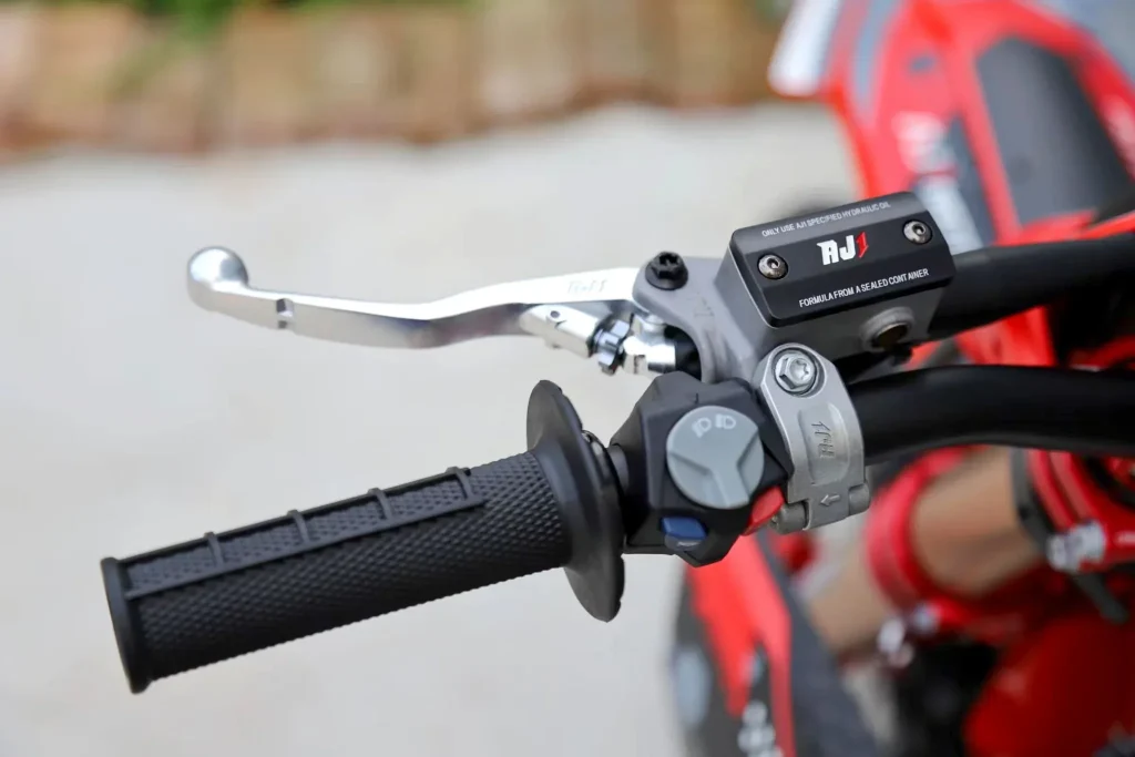 AJ1 motorcycle lever and grip close-up